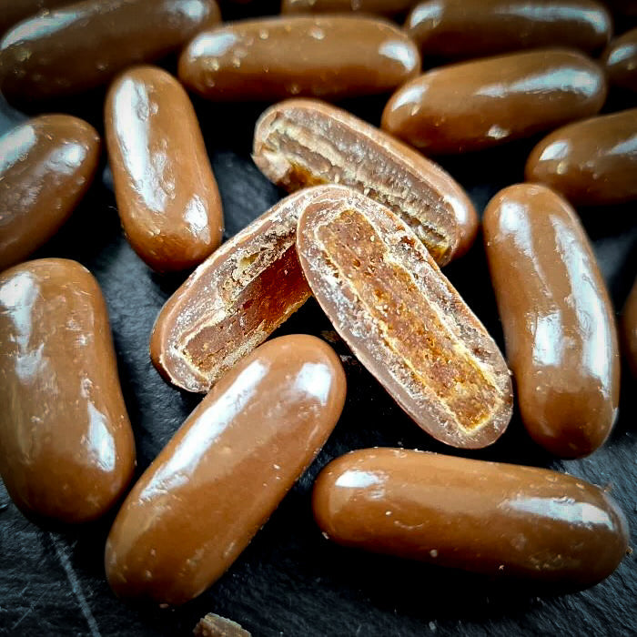 Dražejas ar apelsīnu cukātiem piena beļģu šokolādē